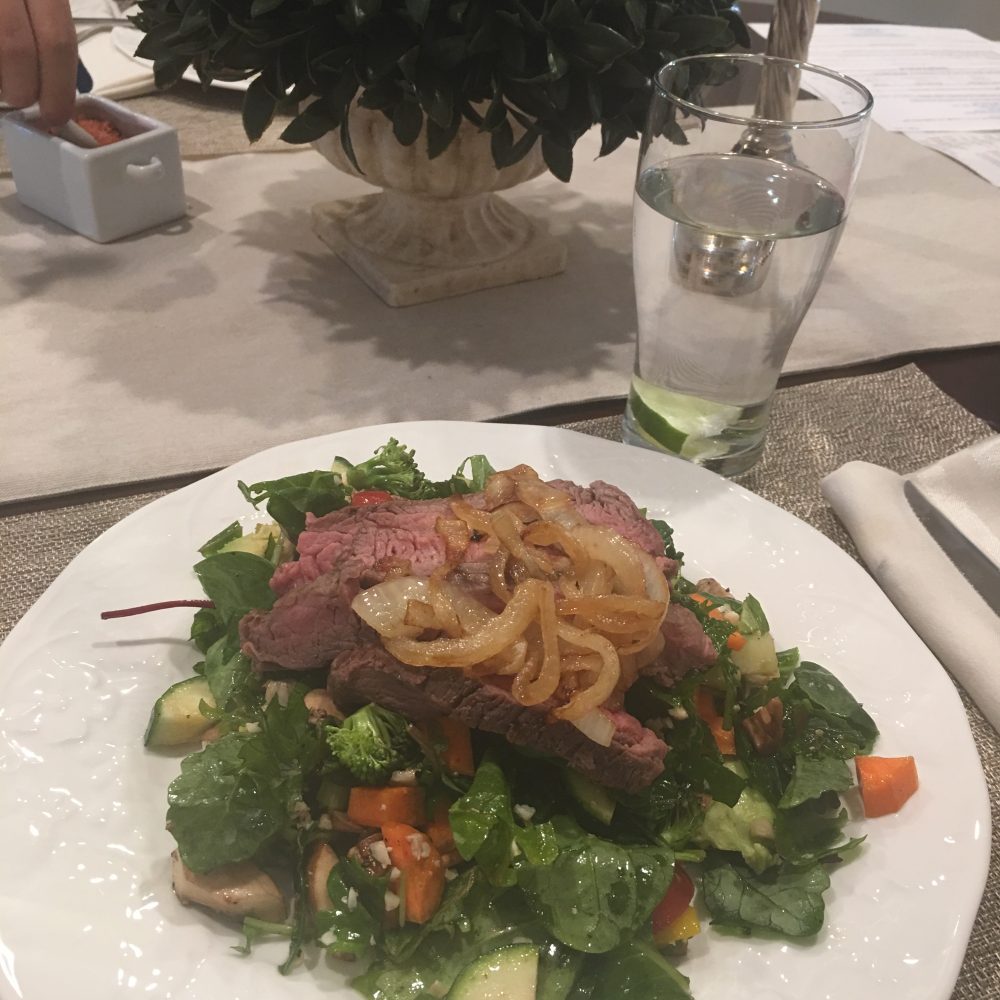 Flank Steak House Salad with sautéed onions